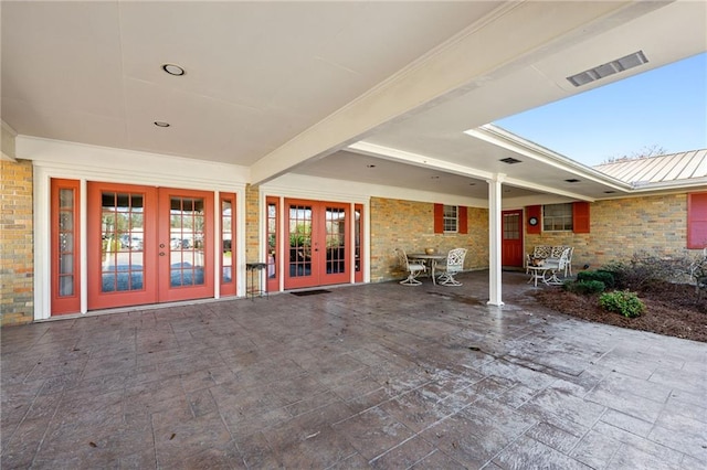 2108 Washington St, Franklinton, LA 70438 - view of patio featuring french doors