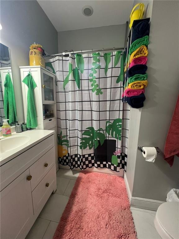 2716 Lavender St, New Orleans, LA 70122 - bathroom with vanity, toilet, a shower with curtain, and tile patterned floors