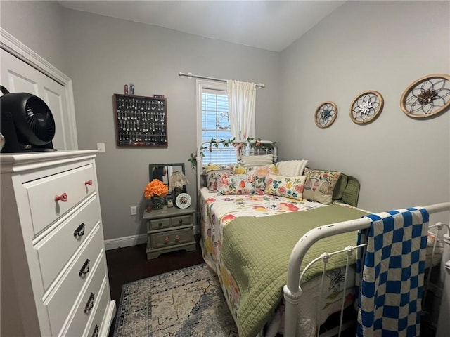 2716 Lavender St, New Orleans, LA 70122 - bedroom with dark wood finished floors and baseboards
