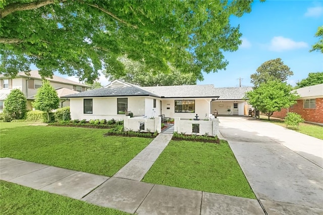 4905 Haring Ct, Metairie, LA 70006 - ranch-style home featuring concrete driveway, stucco siding, and a front lawn