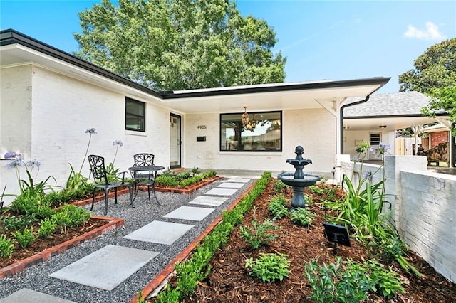 4905 Haring Ct, Metairie, LA 70006 - view of front of property featuring a patio area and brick siding