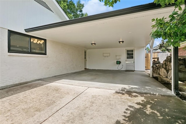 4905 Haring Ct, Metairie, LA 70006 - view of car parking with an attached carport