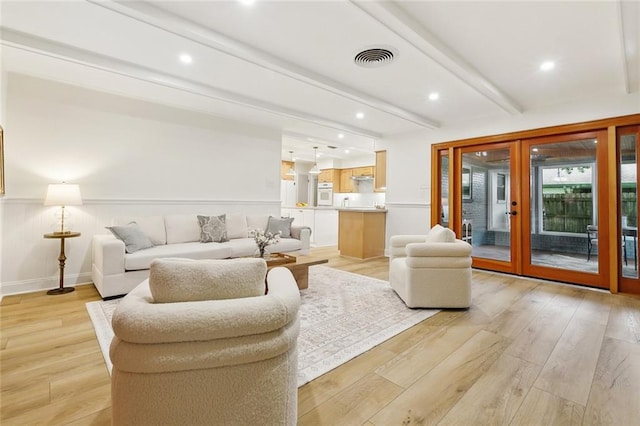 4905 Haring Ct, Metairie, LA 70006 - living area with beam ceiling, light wood-style flooring, and recessed lighting