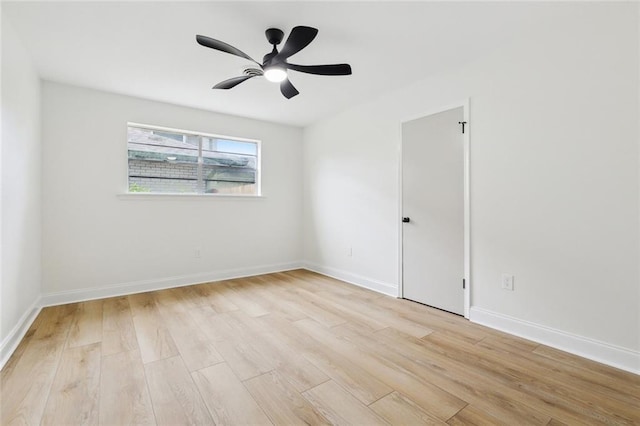 4905 Haring Ct, Metairie, LA 70006 - empty room with light wood-type flooring, ceiling fan, and baseboards