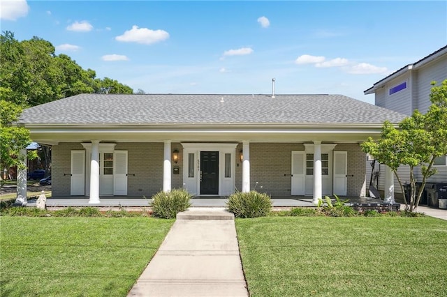 5727 Fleur De Lis Dr, New Orleans, LA 70124 - ranch-style house featuring a porch, brick siding, and a front lawn