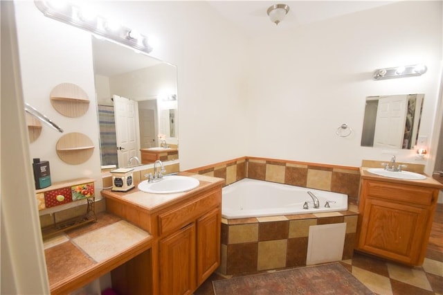 62283 Chappepeela Ridge Rd, Amite, LA 70422 - bathroom with a garden tub and two vanities