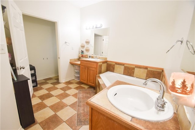62283 Chappepeela Ridge Rd, Amite, LA 70422 - bathroom with vanity, a bath, and baseboards