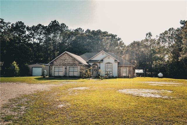 62283 Chappepeela Ridge Rd, Amite, LA 70422 - single story home with a front lawn, dirt driveway, and view of wooded area