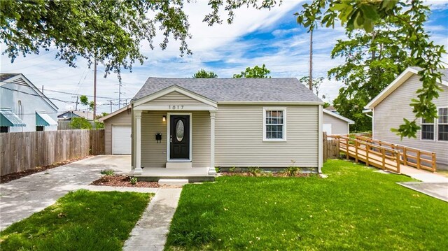 1017 Marian Ave, Metairie, LA 70001 - bungalow-style home with concrete driveway and a shingled roof