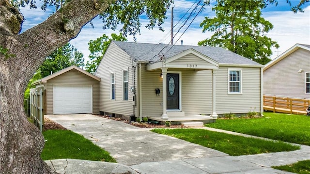 1017 Marian Ave, Metairie, LA 70001 - bungalow-style house with concrete driveway and a garage