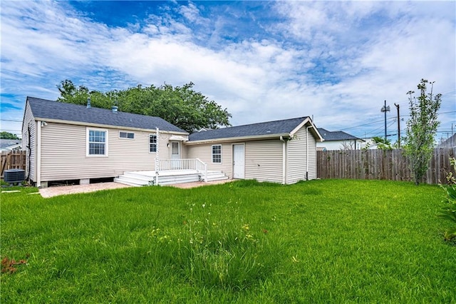 1017 Marian Ave, Metairie, LA 70001 - rear view of property with a deck and central AC unit