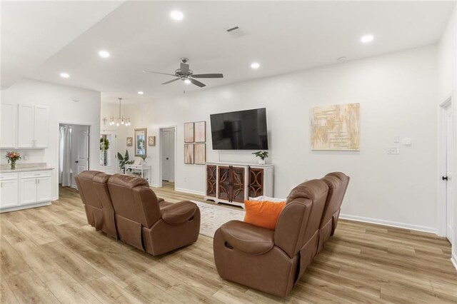 2641 Anchor Dr, Marrero, LA 70072 - living area featuring ceiling fan, recessed lighting, light wood-style floors, baseboards, and a chandelier