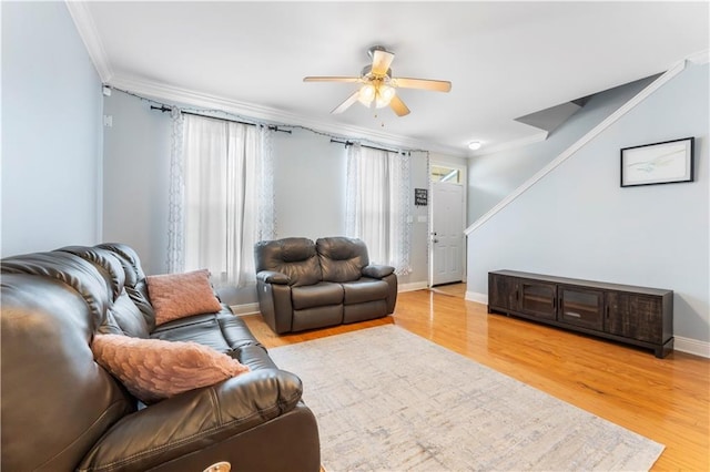5315 Arlington Ct, Baton Rouge, LA 70820 - living room featuring crown molding, ceiling fan, healthy amount of natural light, and light wood-type flooring