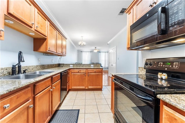 5315 Arlington Ct, Baton Rouge, LA 70820 - kitchen featuring black appliances, ornamental molding, a chandelier, a peninsula, and light tile patterned flooring