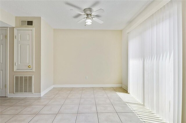 1729 Newport Pl Unit 9, Kenner, LA 70065 - unfurnished room featuring ceiling fan, light tile patterned floors, and baseboards