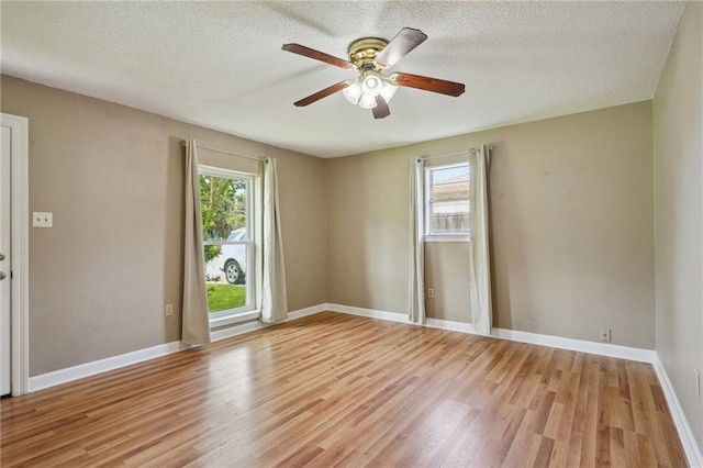 4124 Ames Blvd, Marrero, LA 70072 - spare room featuring light wood finished floors, ceiling fan, a textured ceiling, and baseboards