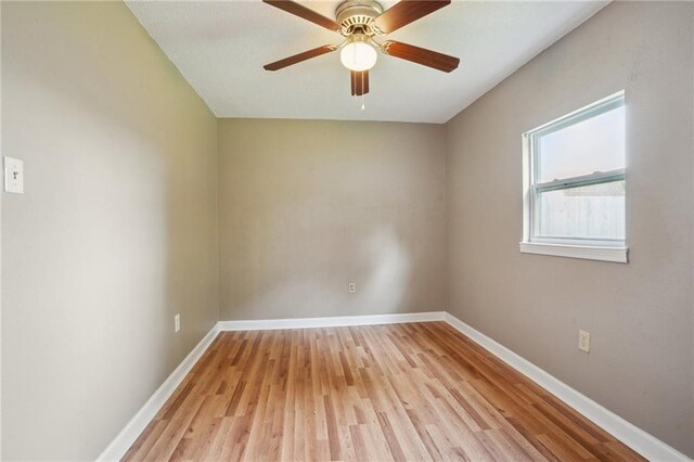 4124 Ames Blvd, Marrero, LA 70072 - empty room featuring light wood-type flooring, baseboards, and a ceiling fan