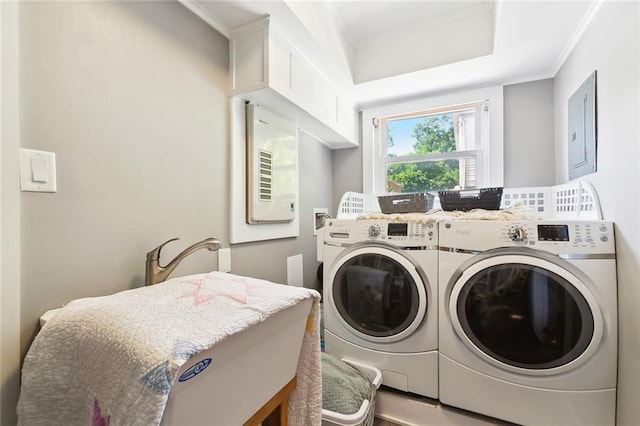 623 Bonnabel Blvd, Metairie, LA 70005 - laundry room with washing machine and dryer, ornamental molding, and electric panel