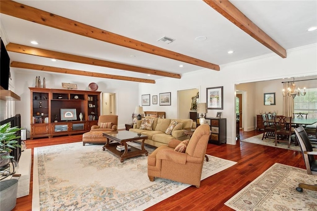 63 Doubloon Dr, Slidell, LA 70461 - living room with a chandelier, wood finished floors, beam ceiling, and recessed lighting