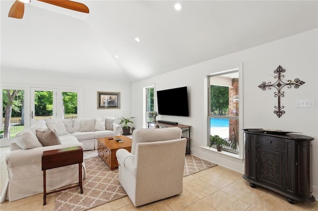 63 Doubloon Dr, Slidell, LA 70461 - living room with lofted ceiling, healthy amount of natural light, light tile patterned floors, ceiling fan, and recessed lighting