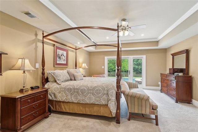 63 Doubloon Dr, Slidell, LA 70461 - bedroom with access to outside, light carpet, recessed lighting, crown molding, and a tray ceiling