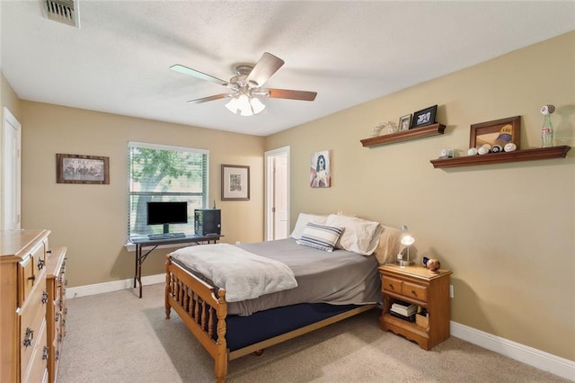 63 Doubloon Dr, Slidell, LA 70461 - bedroom featuring light carpet, baseboards, and ceiling fan