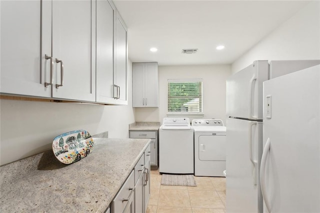 63 Doubloon Dr, Slidell, LA 70461 - washroom with independent washer and dryer, light tile patterned floors, and recessed lighting