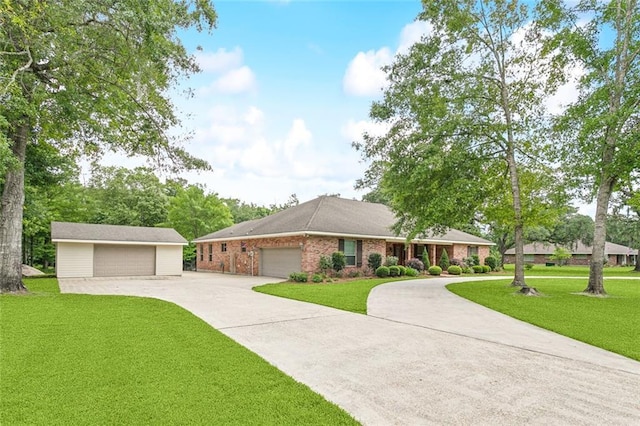 63 Doubloon Dr, Slidell, LA 70461 - ranch-style home featuring a front yard, brick siding, a detached garage, and concrete driveway