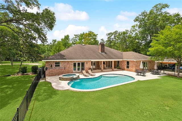 63 Doubloon Dr, Slidell, LA 70461 - view of pool featuring a patio and a pool with connected hot tub