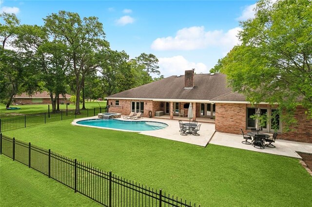 63 Doubloon Dr, Slidell, LA 70461 - view of swimming pool featuring a patio area and a pool with connected hot tub