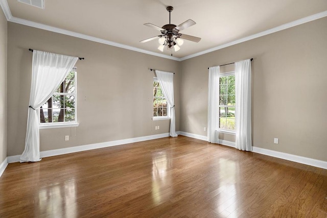 444 Trailhead Dr, Abita Springs, LA 70420 - empty room with wood finished floors, ceiling fan, baseboards, and ornamental molding