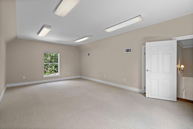 444 Trailhead Dr, Abita Springs, LA 70420 - carpeted spare room featuring baseboards and vaulted ceiling