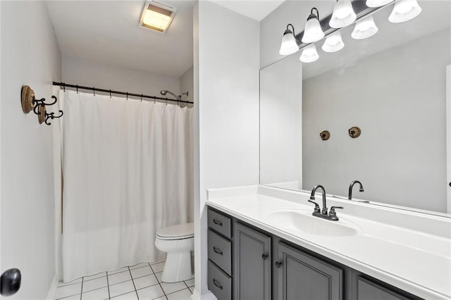 185 Lark St, Slidell, LA 70460 - bathroom featuring vanity, tile patterned flooring, and toilet