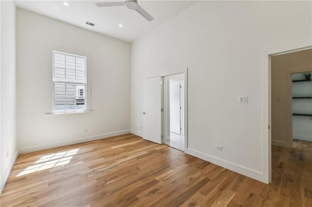 2421 Rousseau St, New Orleans, LA 70130 - empty room featuring a ceiling fan, wood finished floors, baseboards, and recessed lighting