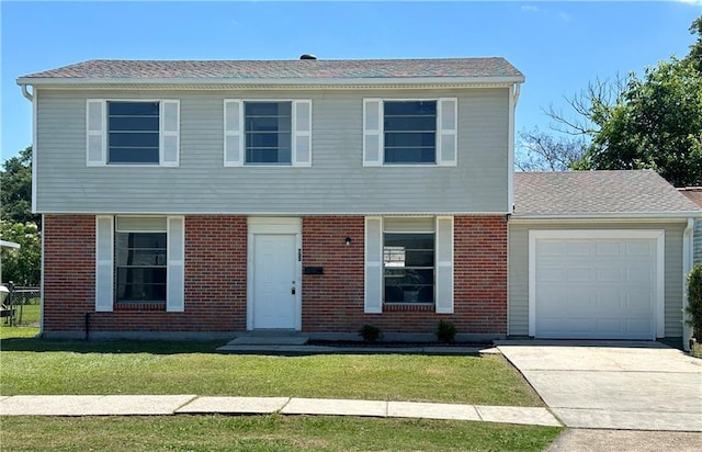 733 Morningside Dr, Gretna, LA 70056 - colonial house with an attached garage, driveway, a front lawn, brick siding, and a shingled roof