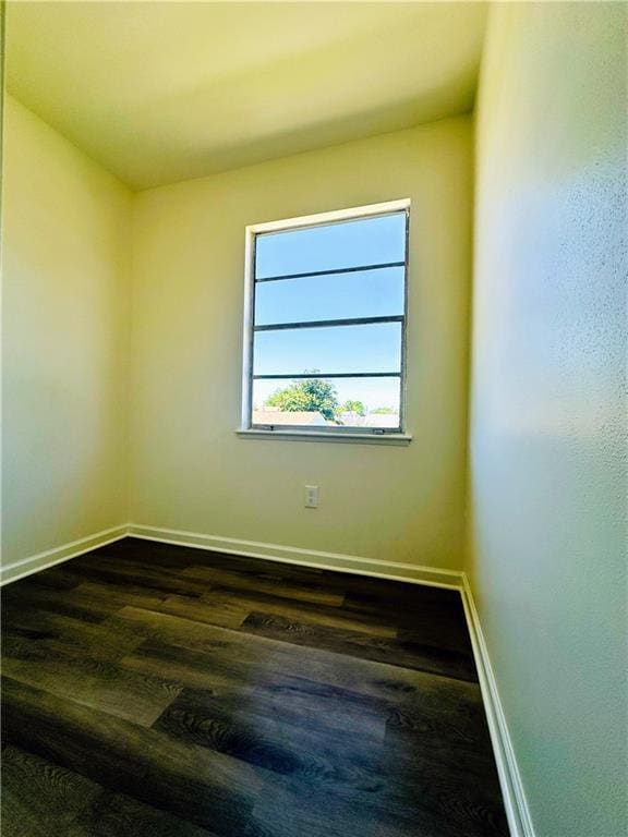 733 Morningside Dr, Gretna, LA 70056 - unfurnished room with dark wood-style flooring and baseboards