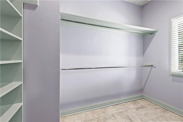 2627 S Carrollton Ave, New Orleans, LA 70118 - spacious closet featuring marble finish floors