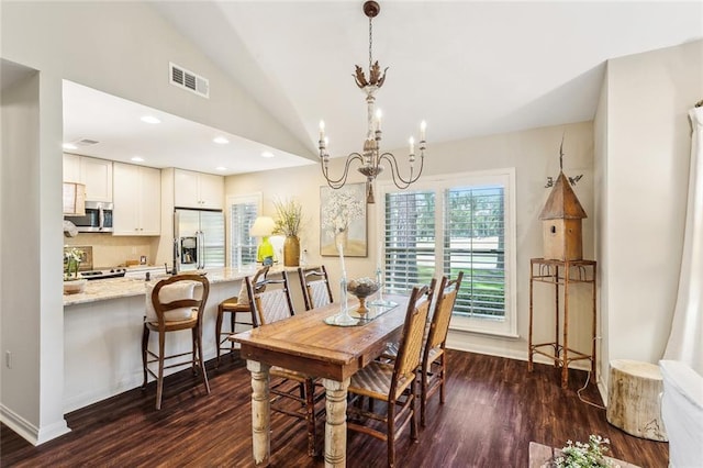 8 S Court Villa Unit 8, Mandeville, LA 70471 - dining area with dark wood-style flooring, a chandelier, lofted ceiling, baseboards, and recessed lighting