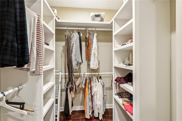 8 S Court Villa Unit 8, Mandeville, LA 70471 - walk in closet with dark wood-style flooring