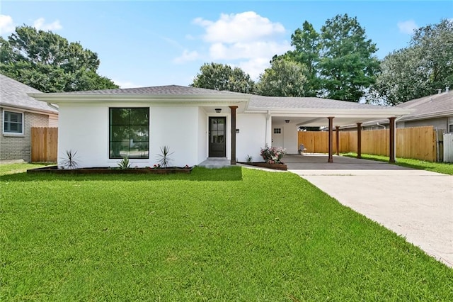 4413 Napoli Dr, Metairie, LA 70002 - view of front of house with stucco siding, an attached carport, and driveway