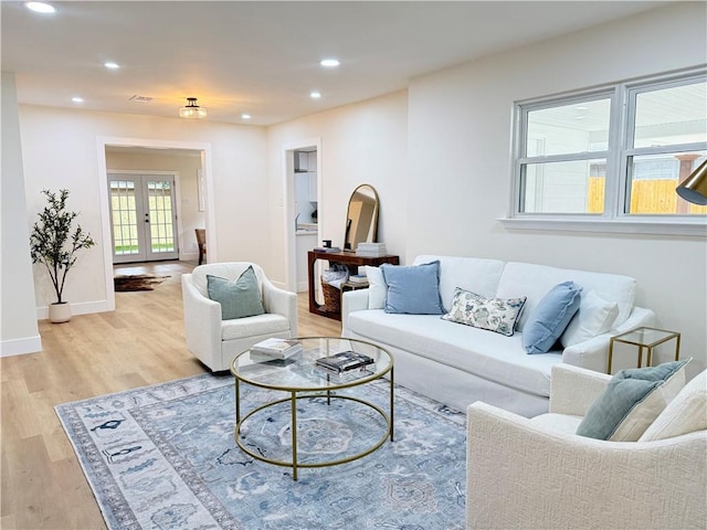 4413 Napoli Dr, Metairie, LA 70002 - living area with light wood-style floors, recessed lighting, and french doors