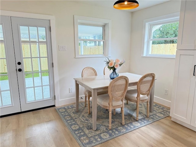 4413 Napoli Dr, Metairie, LA 70002 - dining area featuring light wood-type flooring and french doors