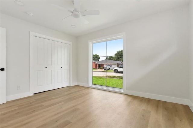 4413 Napoli Dr, Metairie, LA 70002 - unfurnished bedroom featuring light wood-style floors, a closet, and a ceiling fan