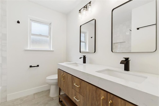 4413 Napoli Dr, Metairie, LA 70002 - bathroom with double vanity and tile patterned floors
