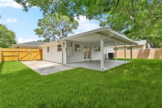 4413 Napoli Dr, Metairie, LA 70002 - back of house with french doors, a fenced backyard, a patio, and a gate