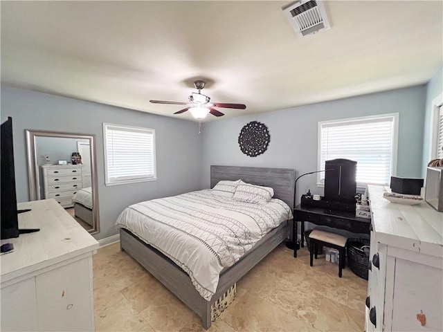 6021 Amhurst St, Metairie, LA 70003 - bedroom featuring multiple windows and ceiling fan
