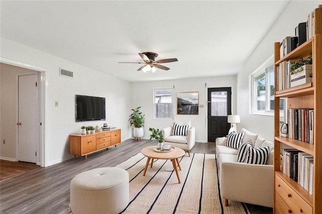 929 Franklin Ave, Jefferson, LA 70123 - living room featuring plenty of natural light, wood finished floors, ceiling fan, and baseboards