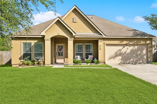317 Haven Way, Lacombe, LA 70445 - view of front of property featuring a garage, stucco siding, driveway, and a shingled roof