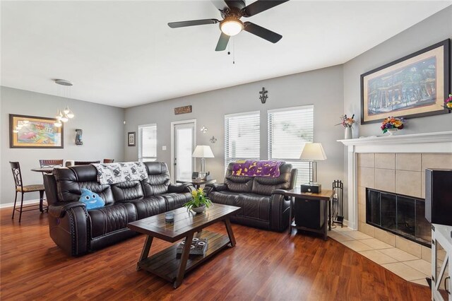 317 Haven Way, Lacombe, LA 70445 - living area featuring healthy amount of natural light, wood finished floors, a ceiling fan, and a tile fireplace