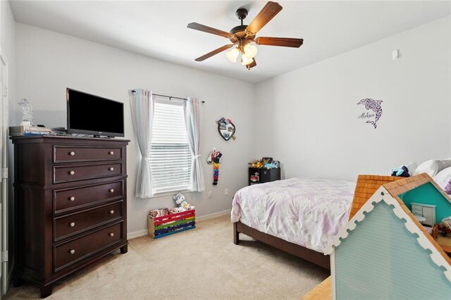 317 Haven Way, Lacombe, LA 70445 - bedroom featuring baseboards, light colored carpet, and a ceiling fan